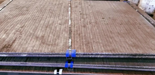 双金属堆焊耐磨板赋能刮板机抗磨升级