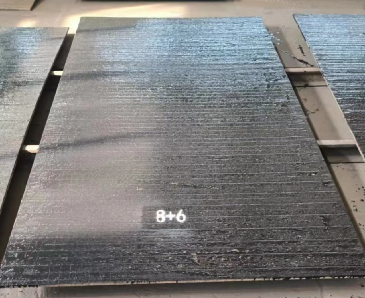 双金属堆焊耐磨板在循环风机中的耐磨抗冲击防护及效能提升机制